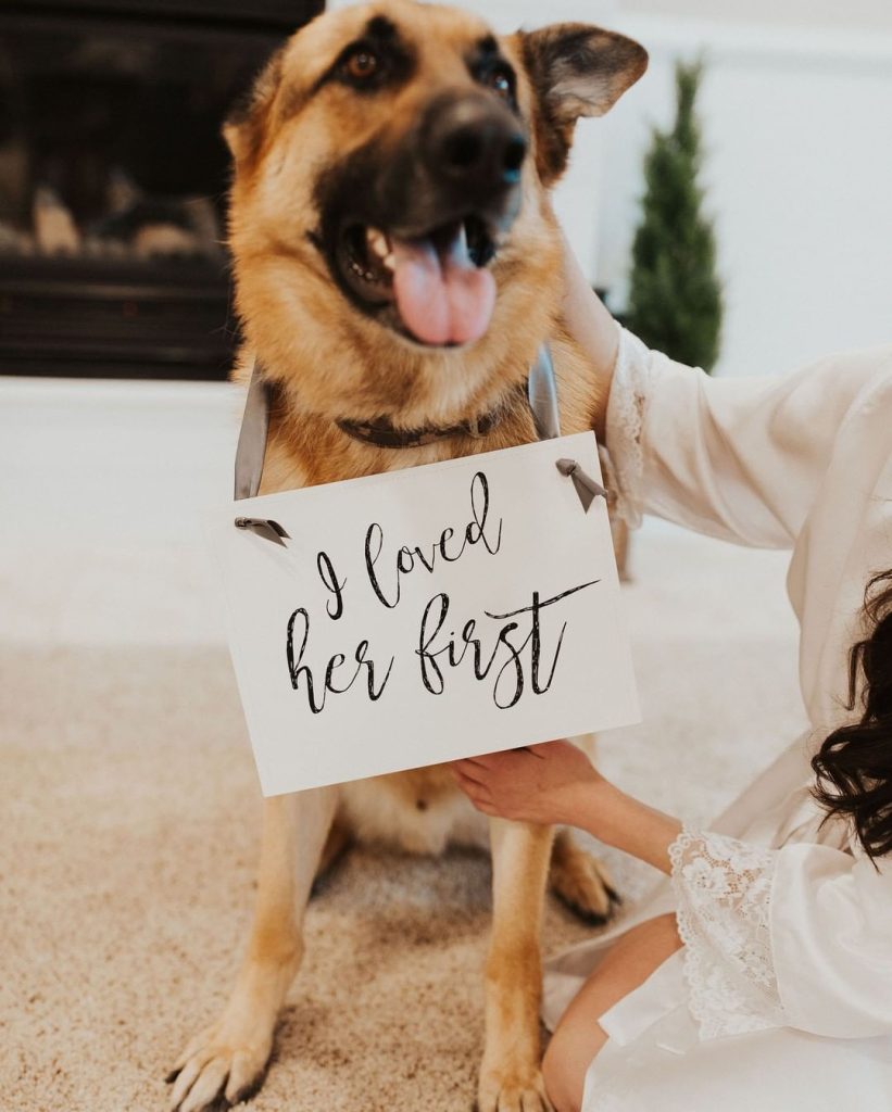 i loved her first dog sign at wedding ceremony
